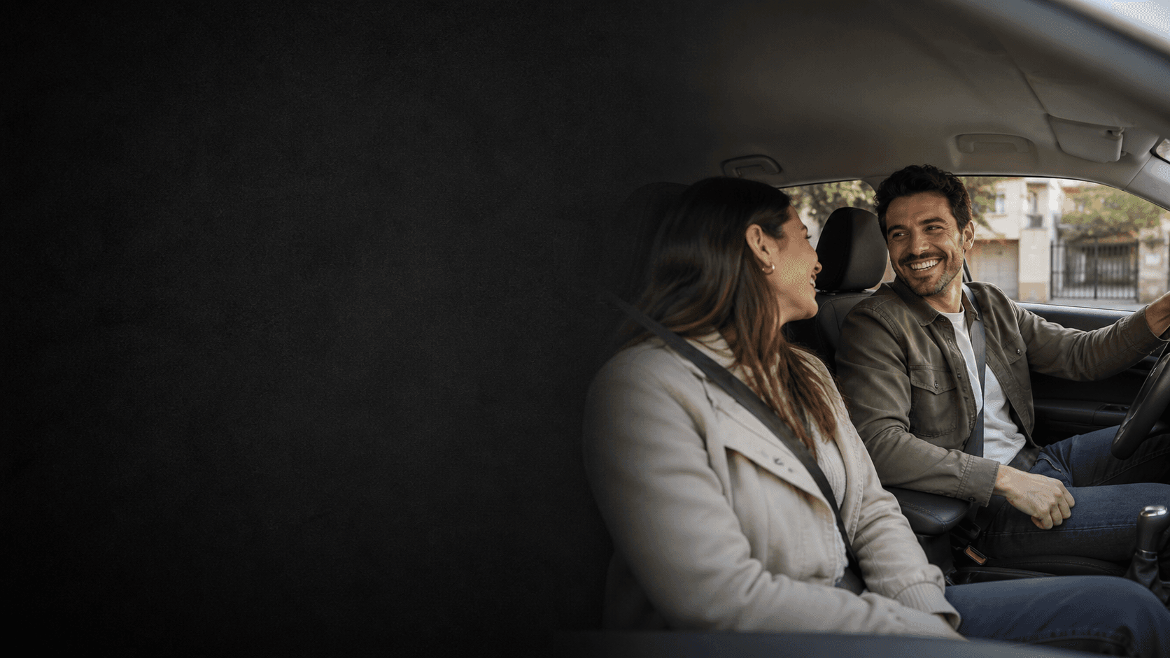 Couple inside a car after a test drive
